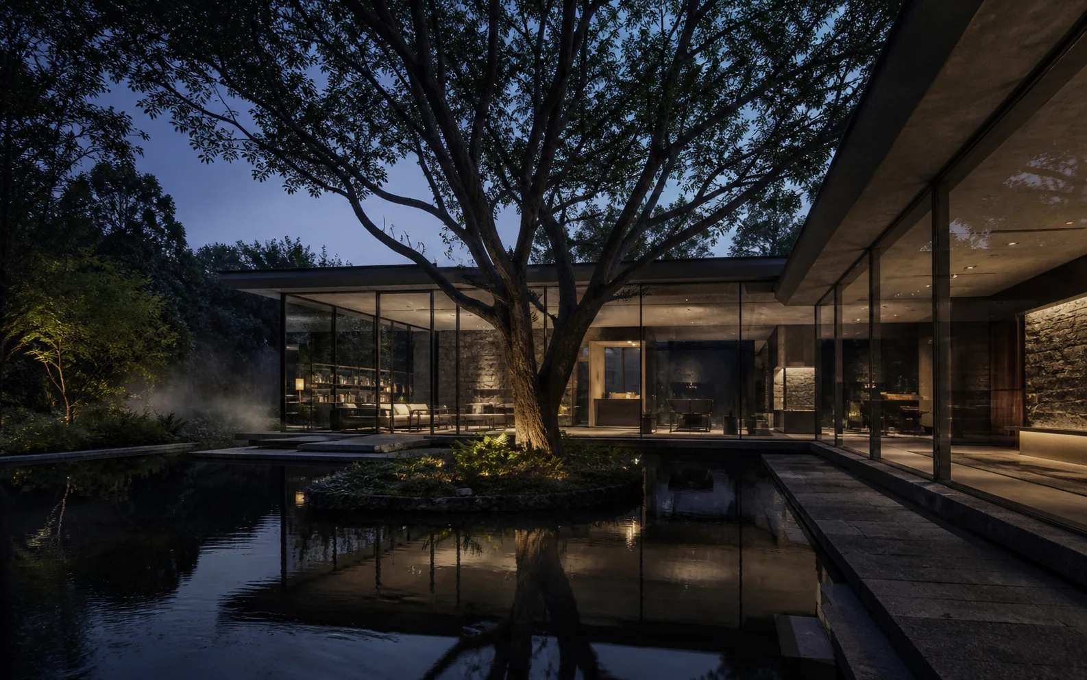 Glass courtyard residence wrapped around a mature tree at dusk